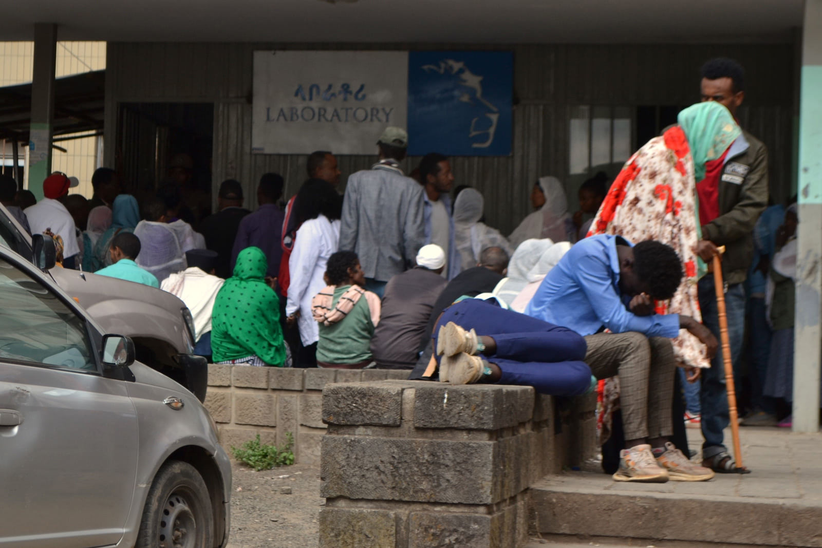 Ethiopia people waiting outside of a laboratory